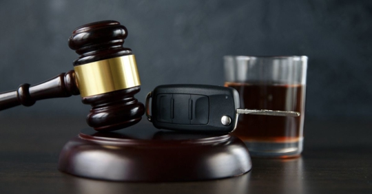 gavel, car keys, alcohol